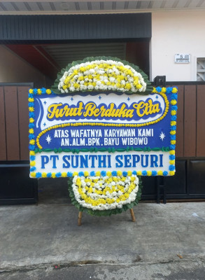 Papan Bunga Duka di Botomuzoi