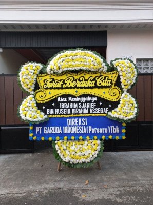 Papan Bunga Duka di Botomuzoi
