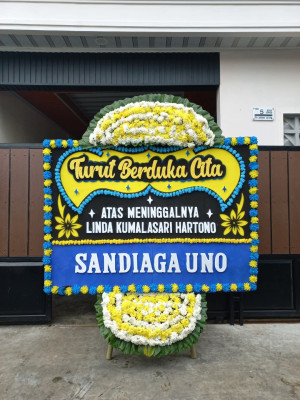 Papan Bunga Duka di Botomuzoi